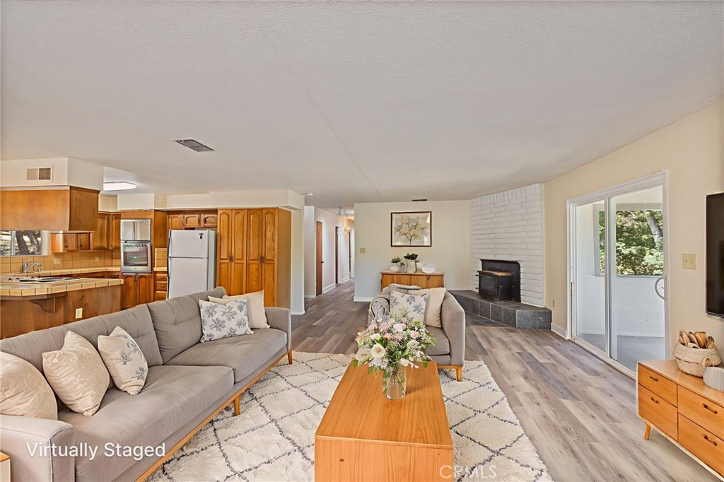 32413 Chickasaw Road Coarsegold, CA 93614 - Photo 6 of 66 a living room with furniture and a table