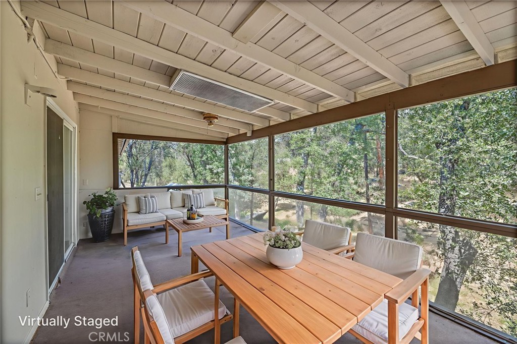 32413 Chickasaw Road Coarsegold, CA 93614 - Photo 7 of 66 a view of a dining room with furniture window and outside view