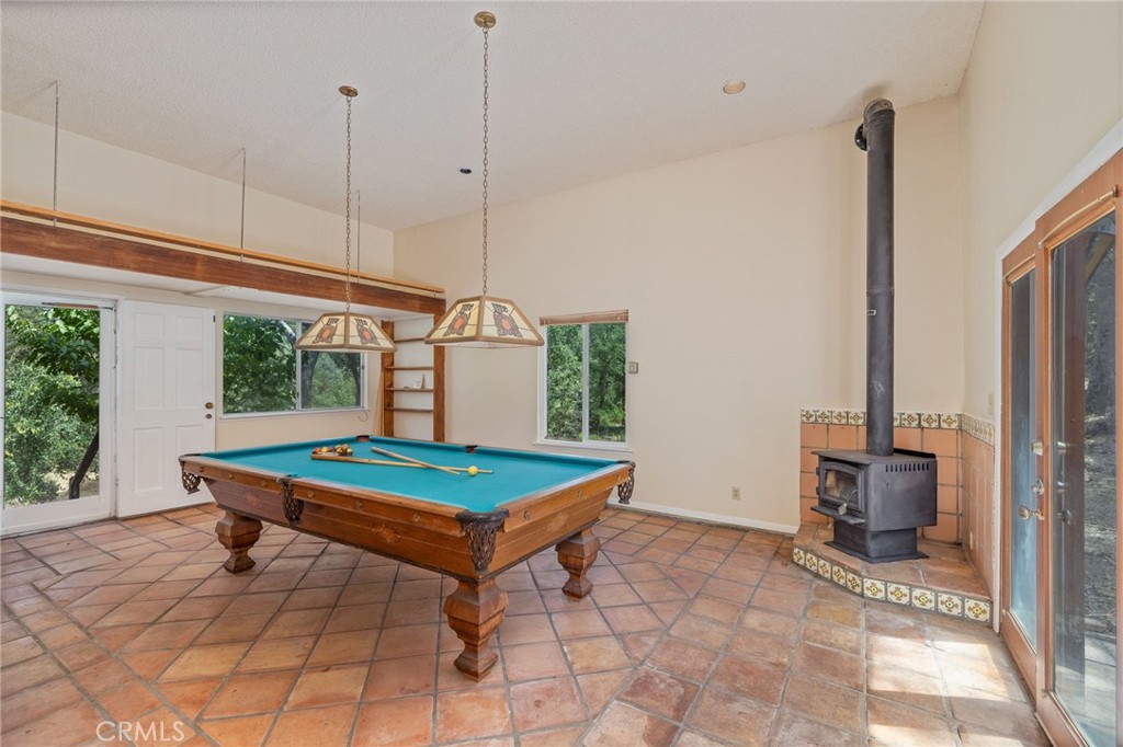 32413 Chickasaw Road Coarsegold, CA 93614 - Photo 9 of 66 a room with pool table and windows