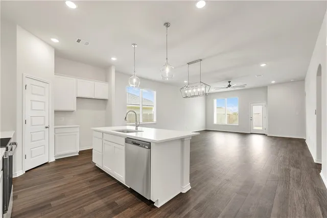 a view of a kitchen and a sink dishwasher oven