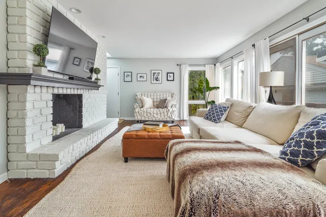 a bed room with a bed and a fireplace