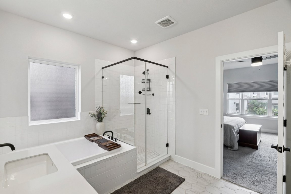 6001 McMurtry Street Austin, TX 78747 - Photo 13 of 26 a bedroom with a bed and a window