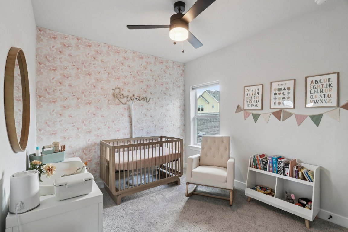 6001 McMurtry Street Austin, TX 78747 - Photo 15 of 26 a bedroom with a bed and a couch