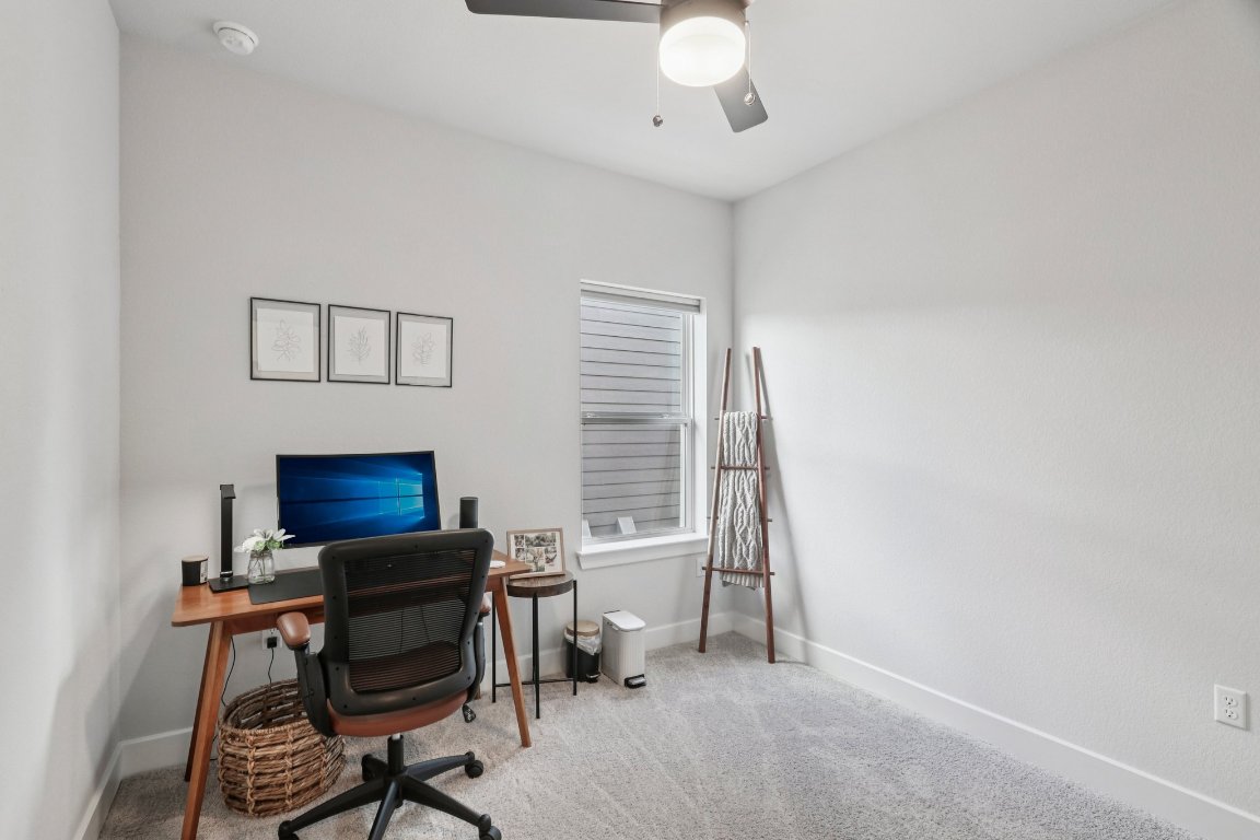 6001 McMurtry Street Austin, TX 78747 - Photo 16 of 26 a living room with furniture and a window