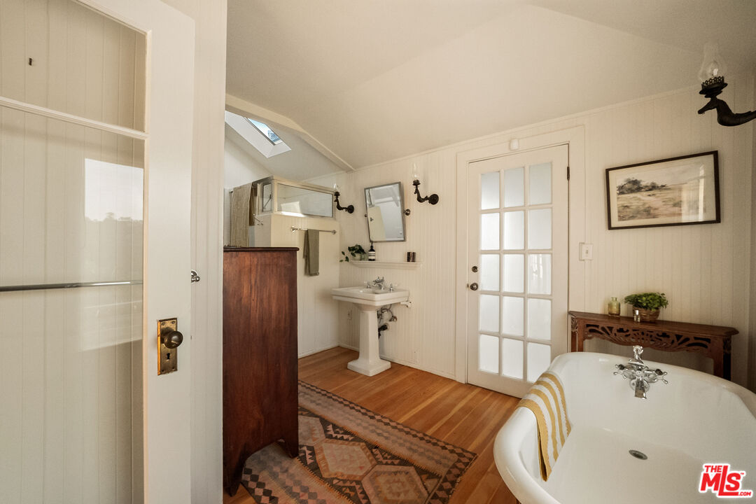 237 Mabery Road Santa Monica, CA 90402 - Photo 23 of 43 a bathroom with a tub sink and shower