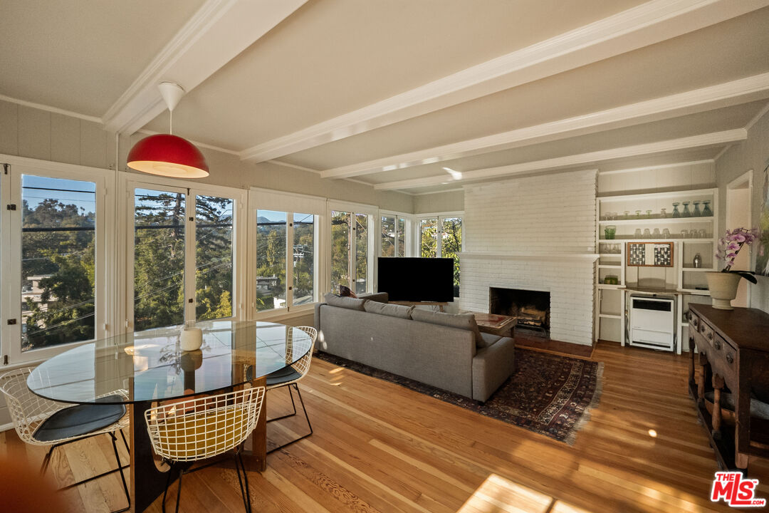 237 Mabery Road Santa Monica, CA 90402 - Photo 32 of 43 a living room with fireplace furniture and a flat screen tv