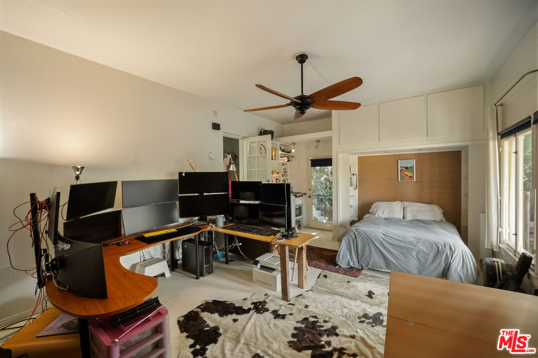 237 Mabery Road Santa Monica, CA 90402 - Photo 41 of 43 a bedroom with furniture and a chandelier