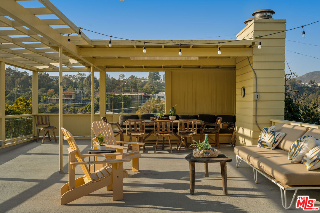 237 Mabery Road Santa Monica, CA 90402 - Photo 8 of 43 a view of a patio with table and chairs
