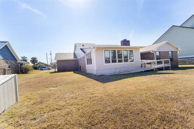 a view of a house with swimming pool