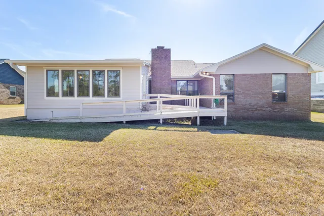 a room with a sink and a mirror