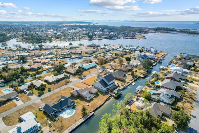 a kitchen with stainless steel appliances a refrigerator and a sink