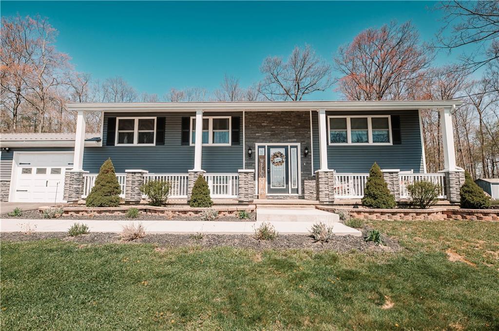 280 Chestnut Road Penn Run, PA 15765 - Photo 2 of 25 a front view of a house with a yard