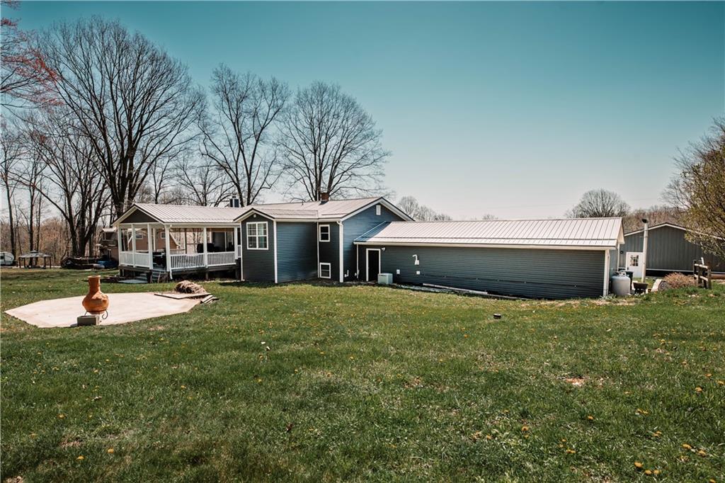 280 Chestnut Road Penn Run, PA 15765 - Photo 4 of 25 a front view of a house with swimming pool