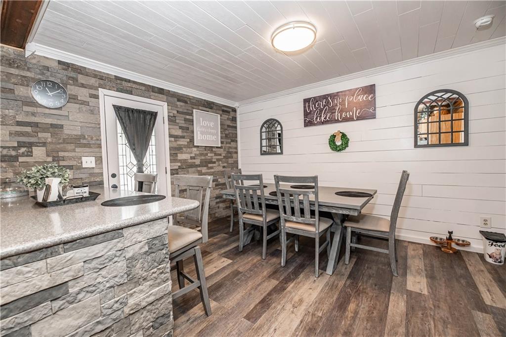 280 Chestnut Road Penn Run, PA 15765 - Photo 8 of 25 a view of a dining room with furniture and wooden floor