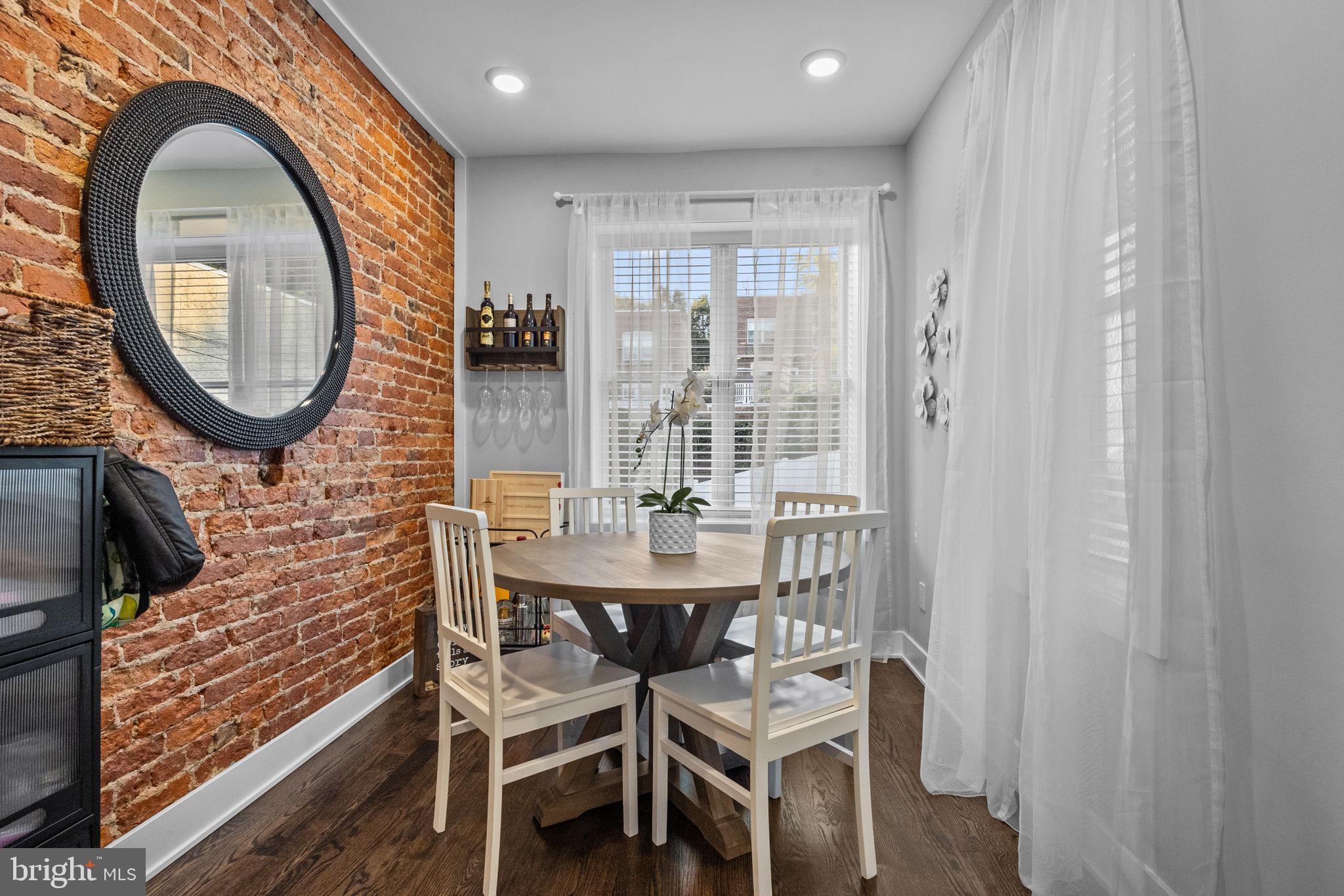 450 Ripka Street Philadelphia, PA 19128 - Photo 15 of 47 a dining room with furniture and wooden floor
