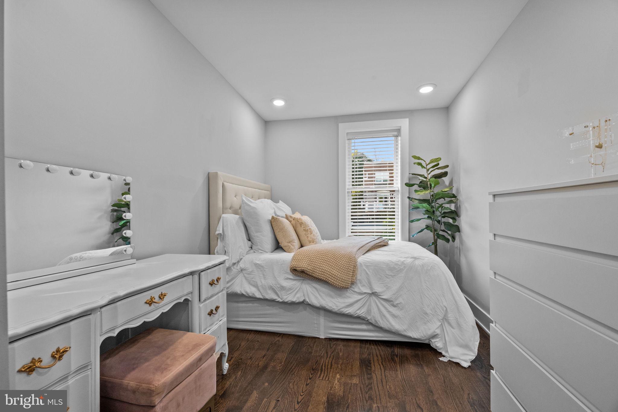 450 Ripka Street Philadelphia, PA 19128 - Photo 19 of 47 a bedroom with a bed and a window