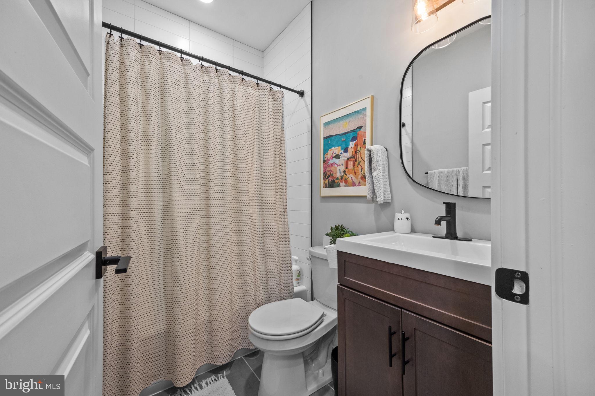 450 Ripka Street Philadelphia, PA 19128 - Photo 21 of 47 a bathroom with a sink toilet and shower