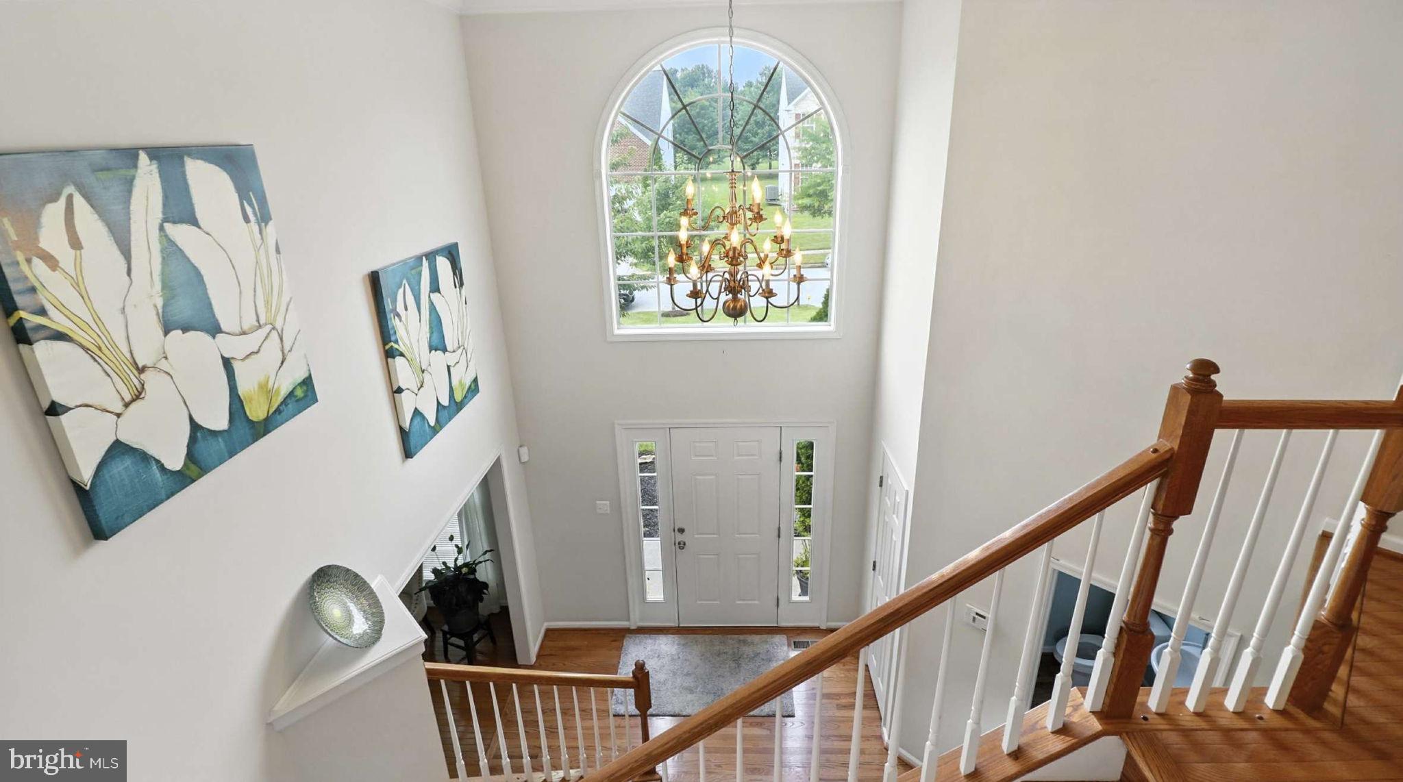 13511 Bermingham Manor Drive Laurel, MD 20708 - Photo 6 of 51 a view of an entryway with wooden floor