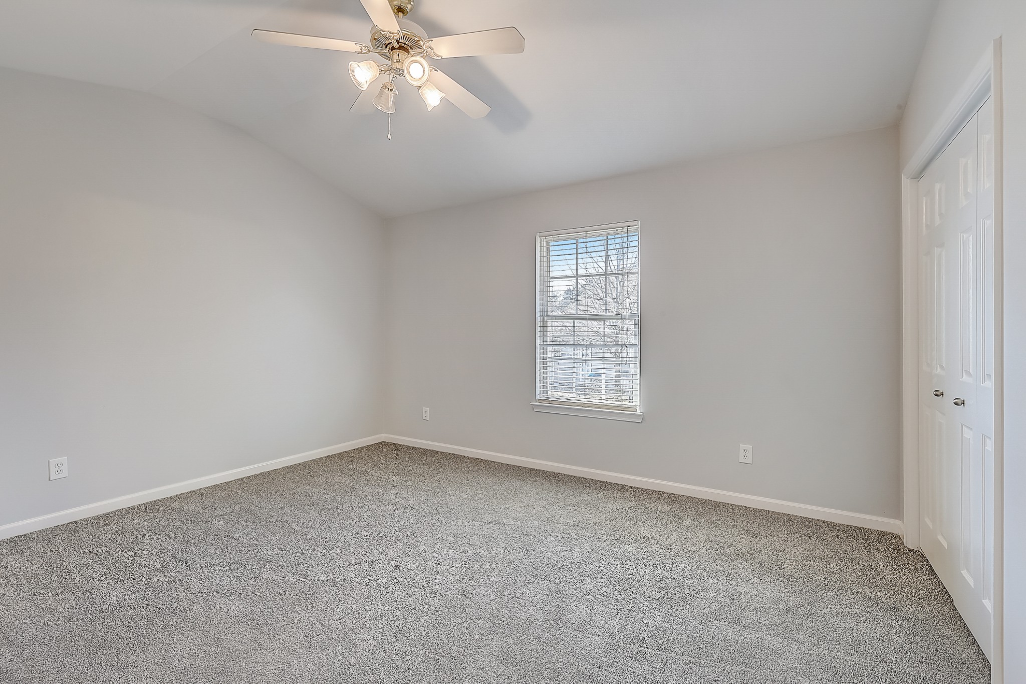 1101 Downs Boulevard, Unit 80 Franklin, TN 37064 - Photo 12 of 19 an empty room with a window and a fan