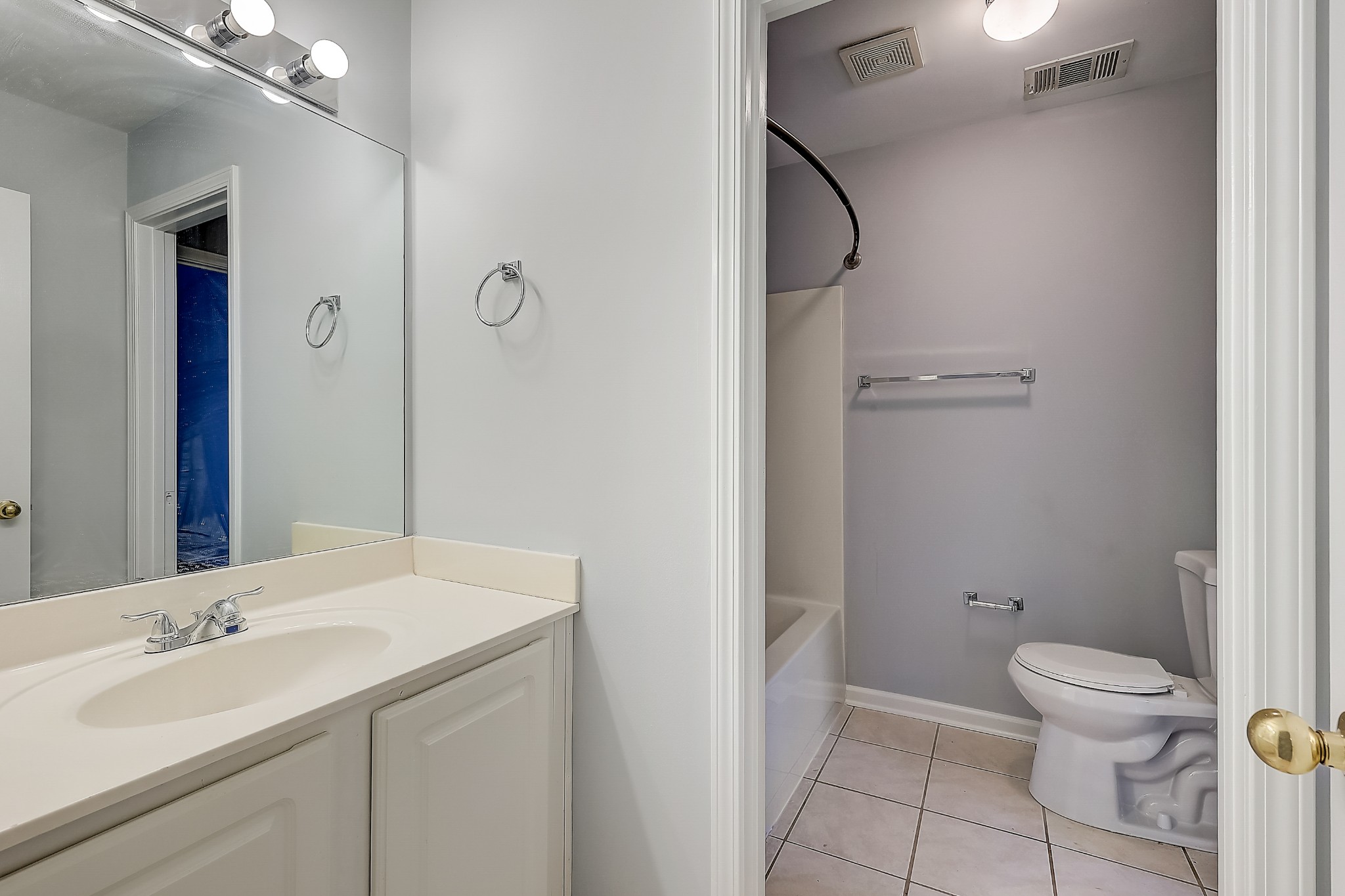 1101 Downs Boulevard, Unit 80 Franklin, TN 37064 - Photo 14 of 19 a bathroom with a sink a toilet and a mirror