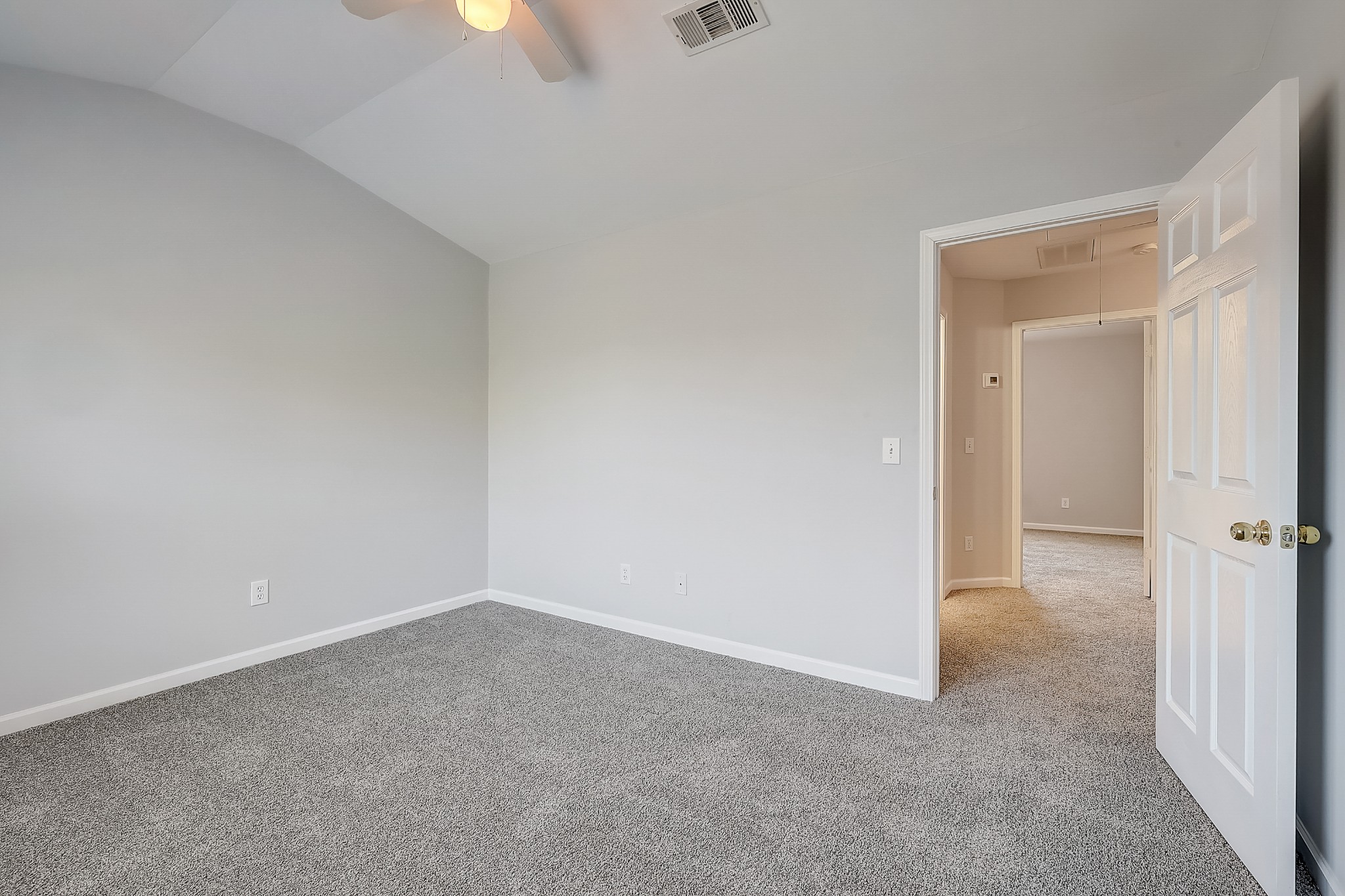 1101 Downs Boulevard, Unit 80 Franklin, TN 37064 - Photo 16 of 19 a view of an empty room and lamp with window