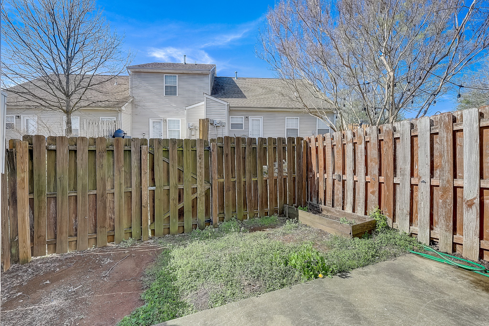 1101 Downs Boulevard, Unit 80 Franklin, TN 37064 - Photo 19 of 19 a front view of a house with a garden
