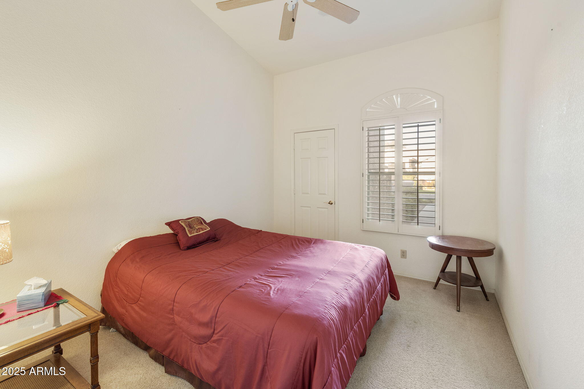 23729 South Pleasant Way, Unit 37 Sun Lakes, AZ 85248 - Photo 18 of 55 a bedroom with a bed and a table in it