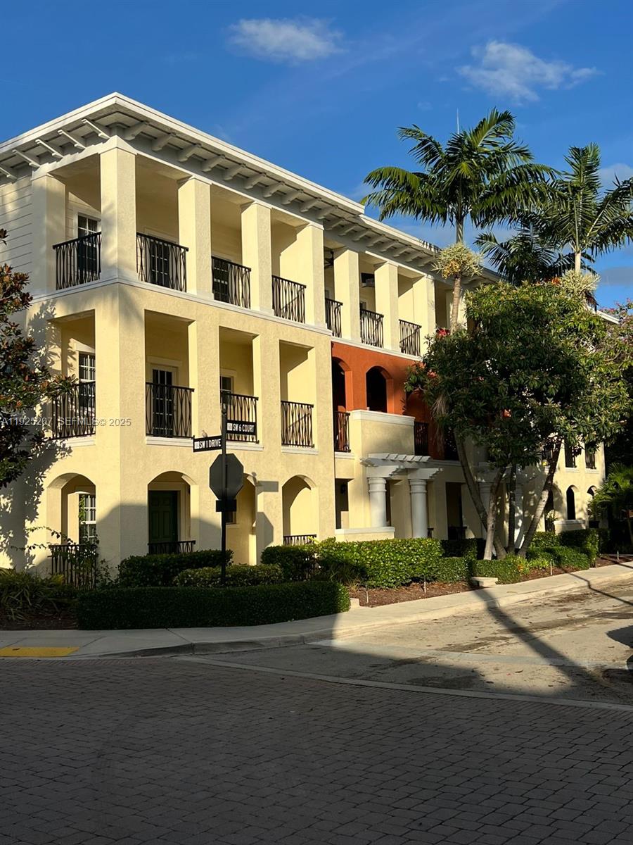 22 Southwest 6th Court, Unit 22 Pompano Beach, FL 33060 - Photo 23 of 26 a view of a building with a street