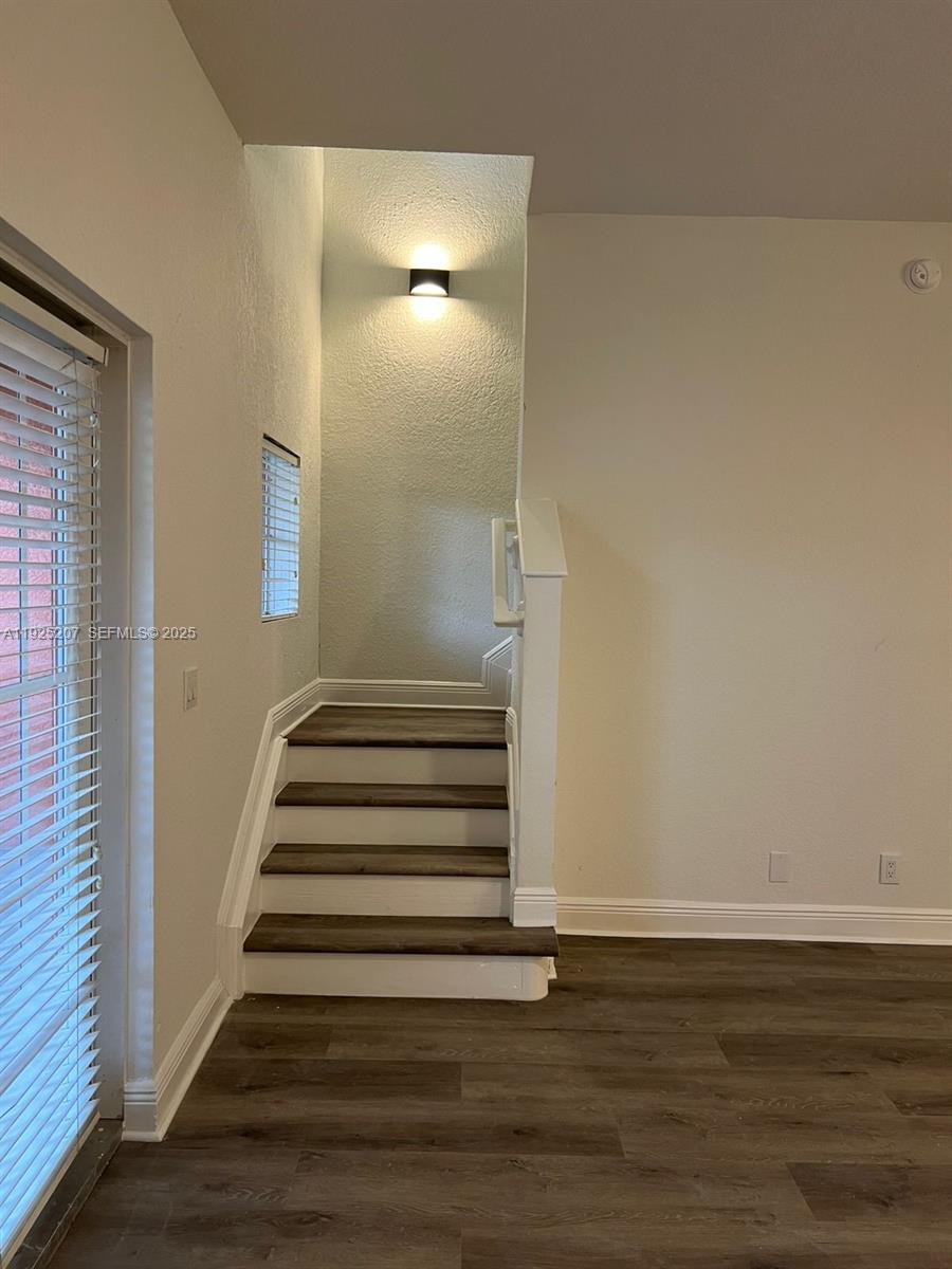 22 Southwest 6th Court, Unit 22 Pompano Beach, FL 33060 - Photo 4 of 26 a view of entryway with wooden floor