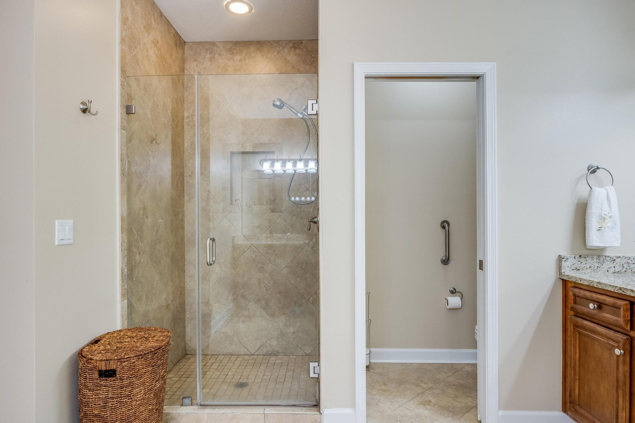 6075 Carina Road Crestview, FL 32539 - Photo 31 of 52 a bathroom with a granite countertop shower