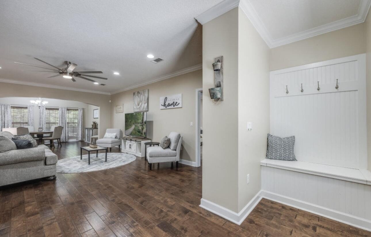 6075 Carina Road Crestview, FL 32539 - Photo 4 of 52 a living room with furniture and a wooden floor