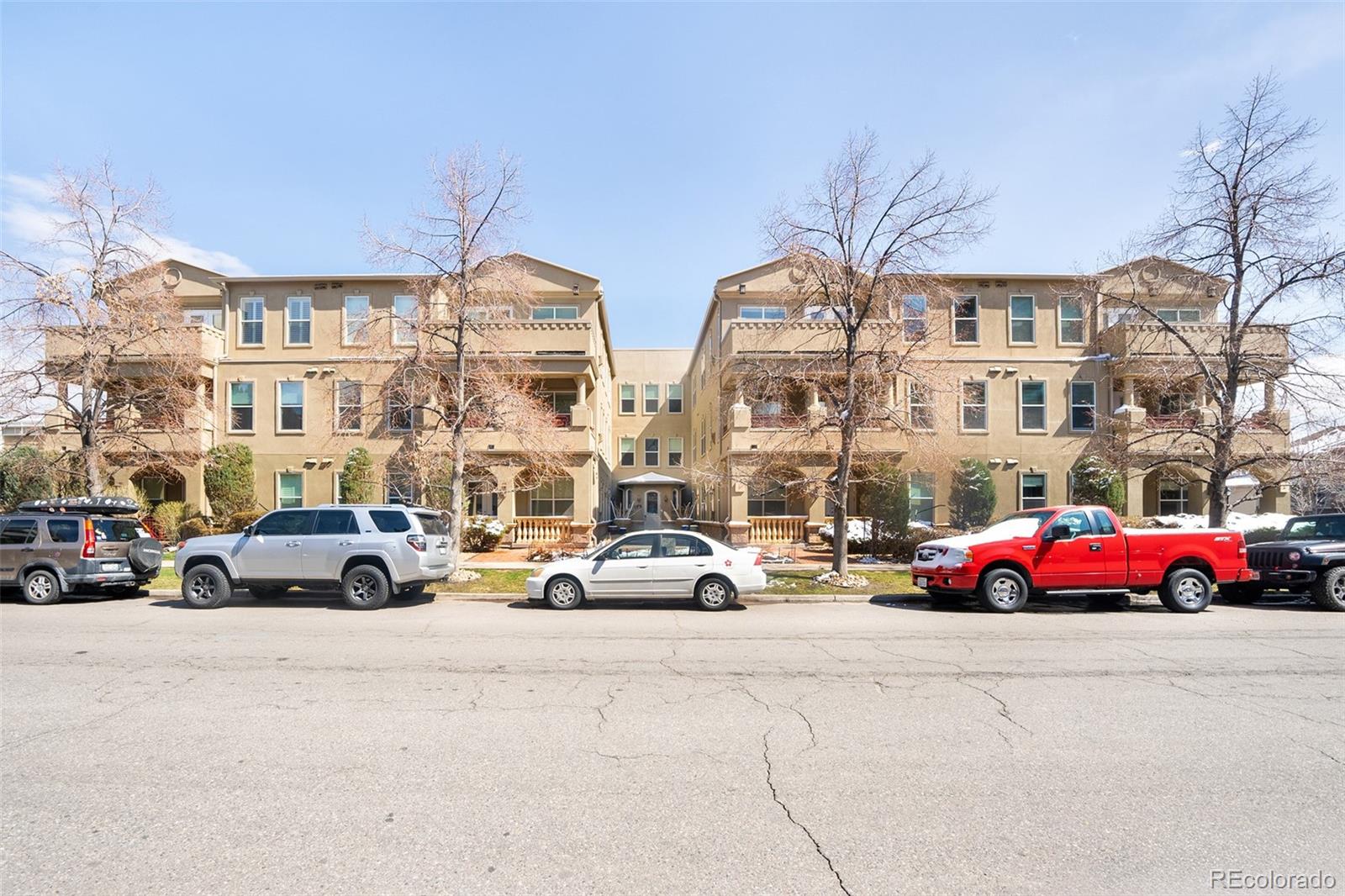 a cars parked in front of a building