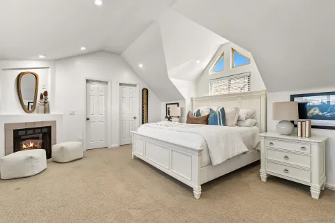 a bed room with a bed and a couch