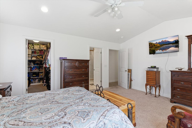 6237 West 4600th Street South Hooper, UT 84315 - Photo 14 of 48 Bedroom with a spacious closet, lofted ceiling, ceiling fan, light carpet, and recessed lighting