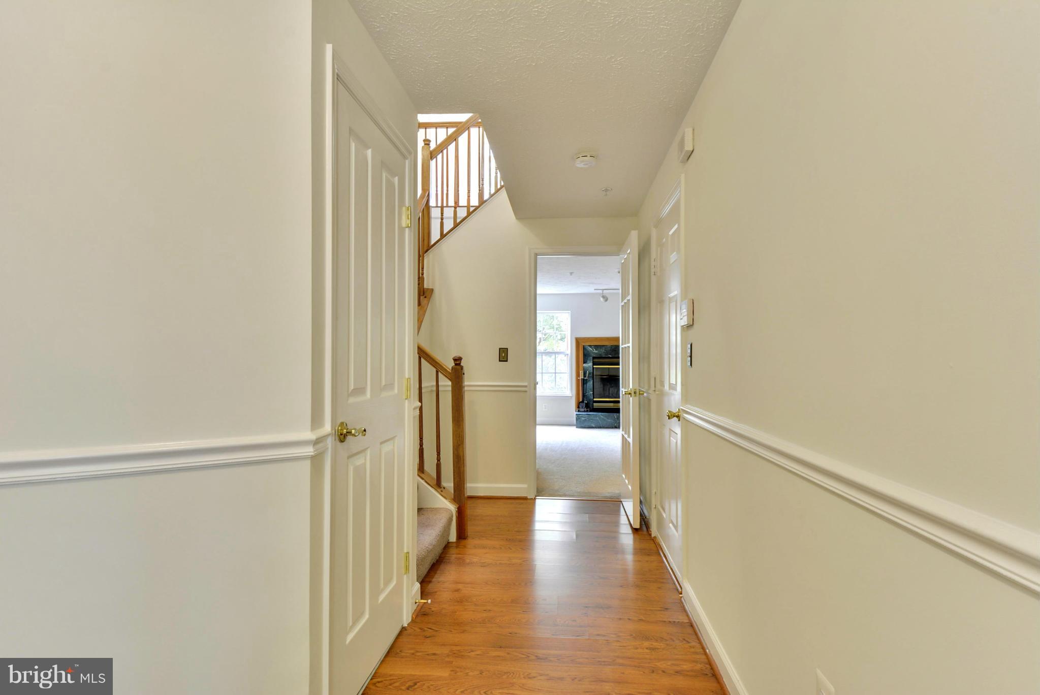1320 Breckenridge Circle Riva, MD 21140 - Photo 22 of 30 a view of a hallway with wooden floor and staircase