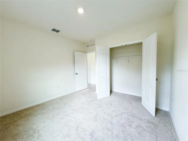 a view of a bathroom with a glass door shower