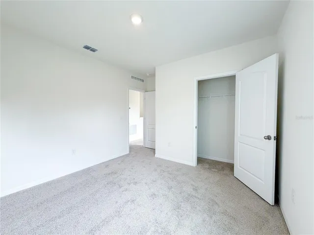 a bathroom with a toilet and a bathtub