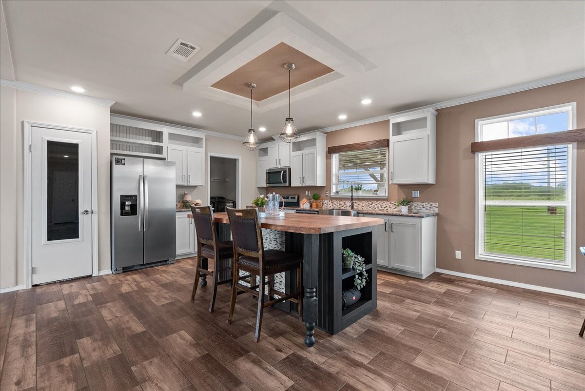 8710 Fm 646 Road South Santa Fe, TX 77510 - Photo 5 of 32 Open-concept layout designed for entertaining, featuring a large island that's perfect for holiday gatherings, family meals, and hosting guests