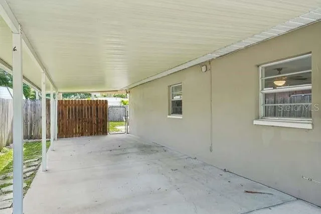 a view of backyard and porch