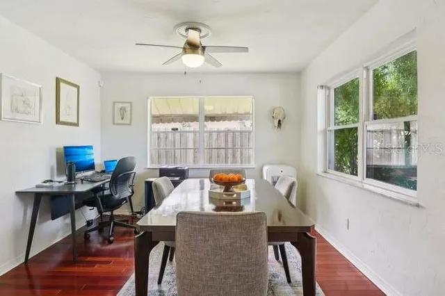 a workspace with furniture and a window