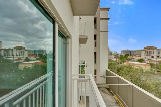 a view of a balcony with city view