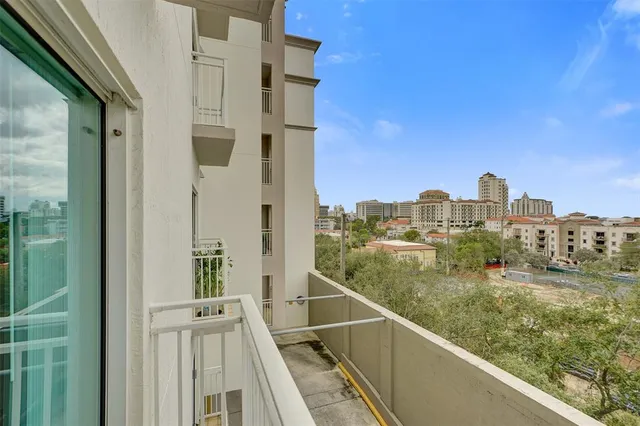 a view of a balcony with city view