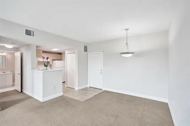 a view of a kitchen and a sink