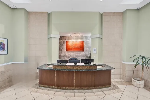 a living room with a couch and a flat screen tv