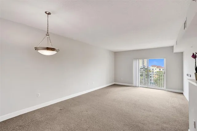 a view of a room with a large window