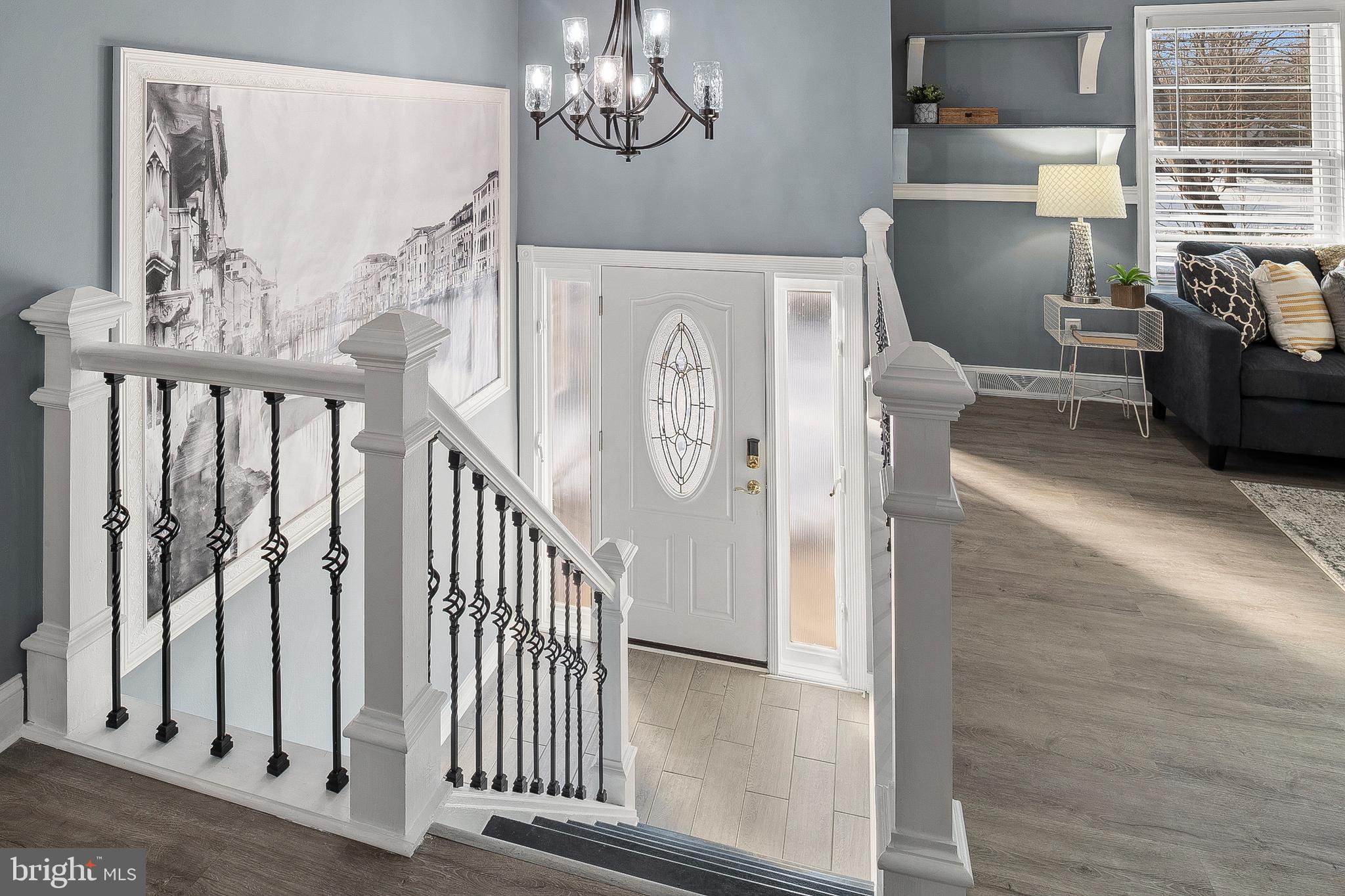 6207 Stevens Forest Road Columbia, MD 21045 - Photo 5 of 34 Foyer from Upper Landing