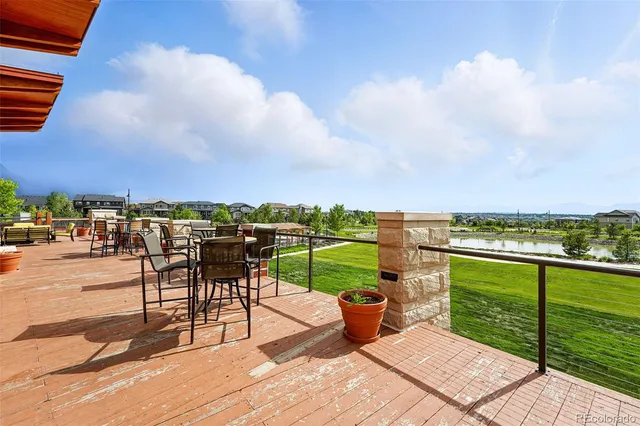 a view of a terrace with furniture