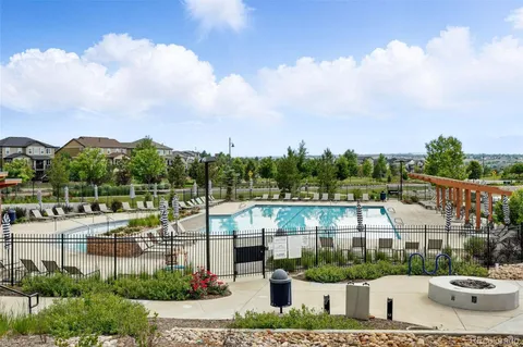 a view of multiple houses with a yard