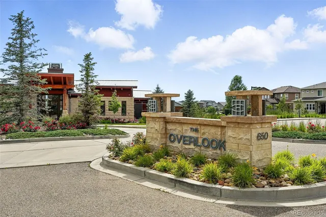 a view of a street with a building in the background