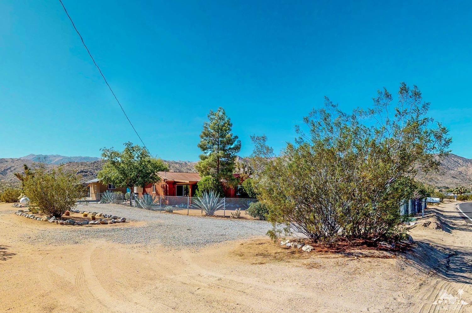 63443 Quail Springs Road Joshua Tree, CA 92252 - Photo 3 of 17 a view of car parked on the side of road